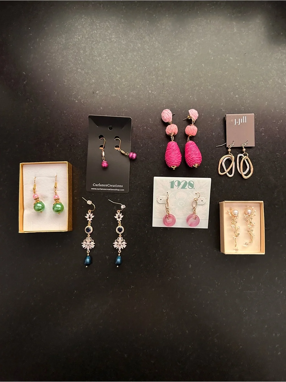 7 pair pierced earrings, drop style, most never worn, gold tone metals.